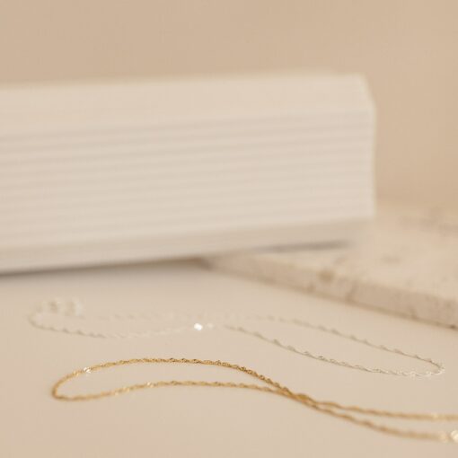 Caitlyn Minimalist's Twisted Singapore Necklace A Dainty Gold Rope Necklace for Layering and Gifting - Image 4