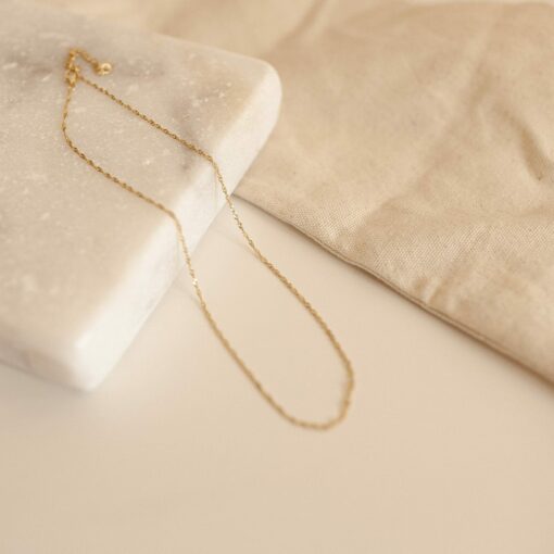 Caitlyn Minimalist's Twisted Singapore Necklace A Dainty Gold Rope Necklace for Layering and Gifting - Image 6