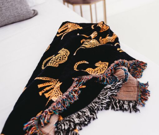 Unleash the Untamed Elegance Luxurious Leopard Throw for a Wildly Chic Home - Image 3