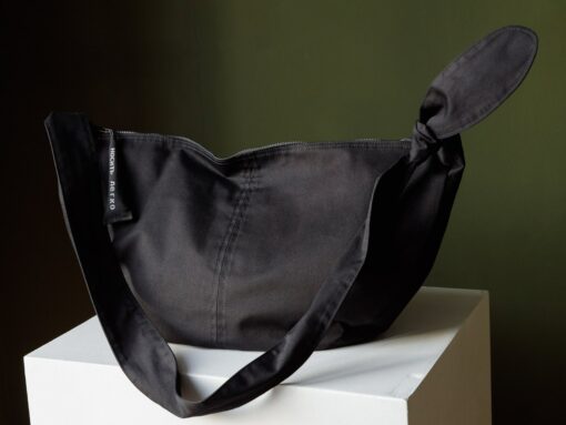 Spacious Black Hobo Bag with Green Lining and Adjustable Strap - Image 2