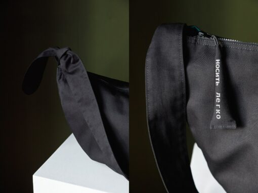 Spacious Black Hobo Bag with Green Lining and Adjustable Strap - Image 4