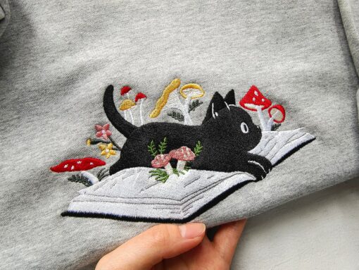 Cozy and Enchanting Embroidered Black Cat and Mushroom Sweatshirt for Cat Lovers - Image 4