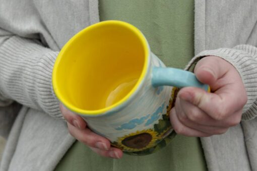 Sunflower of Hope A Ceramic Mug Embracing Ukrainian Resilience - Image 3
