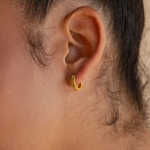 Golden Embrace Ribbed Huggie Hoops for a Timeless Allure - Image 2