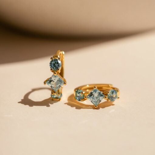Aquamarine Huggie Hoops Shimmering Blue Diamonds in Golden Embrace - Image 3