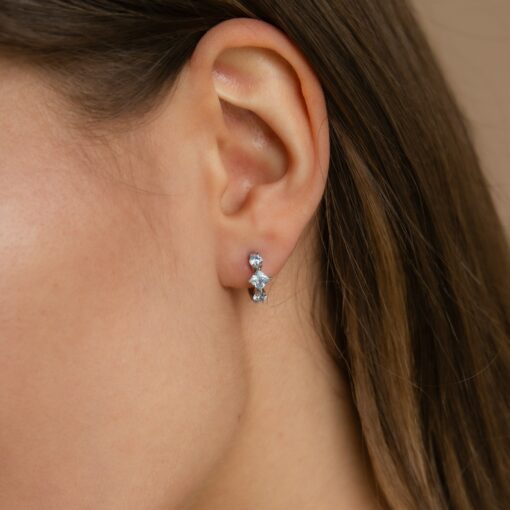 Aquamarine Huggie Hoops Shimmering Blue Diamonds in Golden Embrace - Image 2