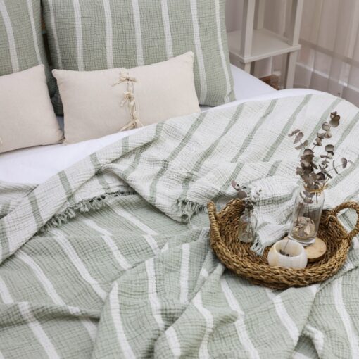 Bohemian Rhapsody Embrace Ethnic Charm with Our Muslin Blanket - Image 6