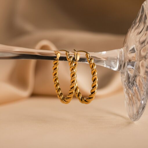 Bold and Twisted Elevate Your Style with Caitlyn's Minimalist Statement Hoops - Image 2