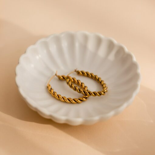 Bold and Twisted Elevate Your Style with Caitlyn's Minimalist Statement Hoops - Image 6