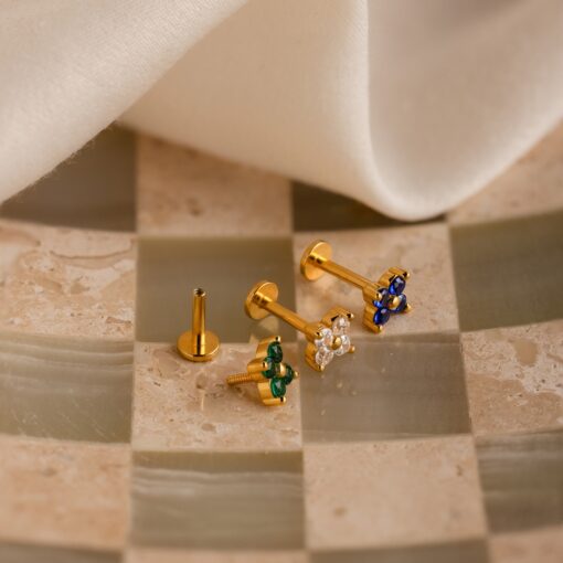 Caitlyn Minimalist's Trio of Floral Studs Sapphire, Diamond, and Gold - Image 4