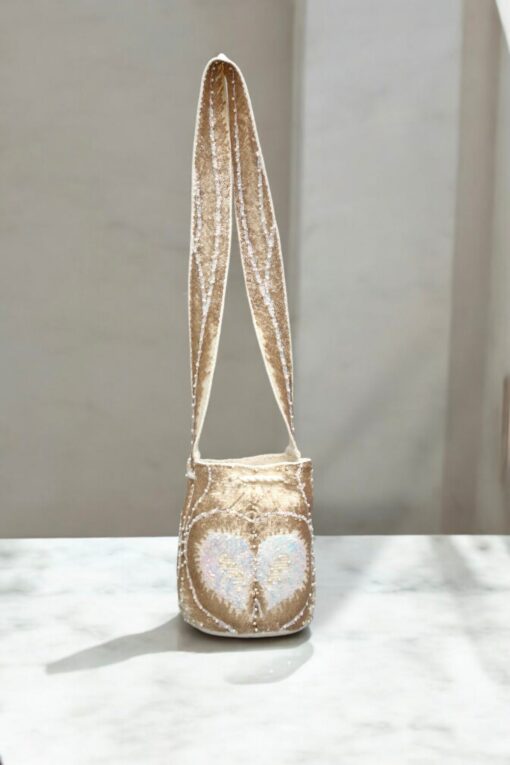 Best-Selling Wayuu Bucket Bag Handcrafted Colombian Crossbody Purse with Intricate White Cross Design - Image 3