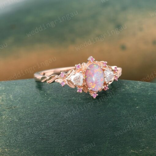 Exquisite Oval Pink Opal Engagement Ring A Symphony of Rose Gold, Moissanite, and Pink Sapphire - Image 4