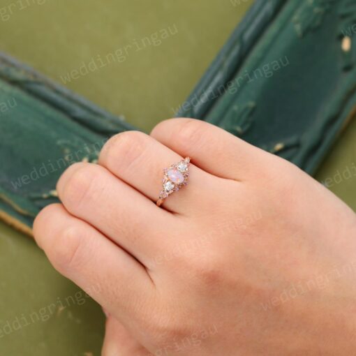 Exquisite Oval Pink Opal Engagement Ring A Symphony of Rose Gold, Moissanite, and Pink Sapphire - Image 2