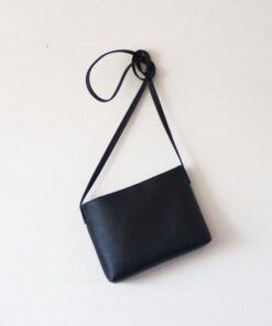 Sleek and Sophisticated The Minimalist Black Leather Crossbody Bag with Magnetic Closure