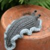 Charming Knitted Slug A Delightful Gift for Garden Enthusiasts