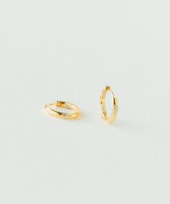 Celestial Embrace Caitlyn's Eternity Pave Huggie Earrings, a Diamond-Studded Symphony