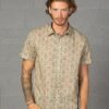 Embark on a Tribal Odyssey Shipibo Short Sleeve Men's Button-Up Shirt for Urban Explorers and Hippie Aesthetes