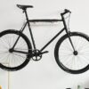 Wall-Mounted Bike Rack Elevate Your Ride with Bonnes Intentions' White Metal Holder