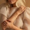 Caitlyn Minimalist's Pearl Station Bracelet A Delicate Charm of Pearls and Gold