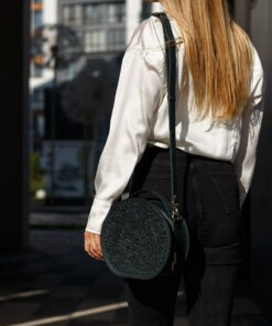 Exquisite Handmade Round Leather Bag with Intricate Flower Embossing