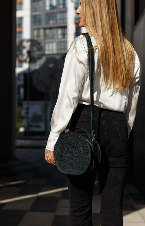 Exquisite Handmade Round Leather Bag with Intricate Flower Embossing