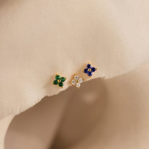 Caitlyn Minimalist's Trio of Floral Studs Sapphire, Diamond, and Gold