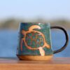 Immerse in the Ocean's Embrace Handmade Sea Turtle Sanctuary Pottery Mug for Marine Enthusiasts