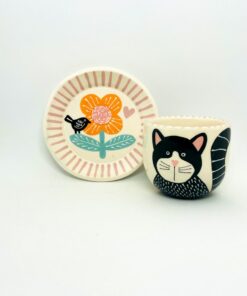 Enchanting Ceramic Cup and Saucer A Feline Fantasy with a Bird and Bloom