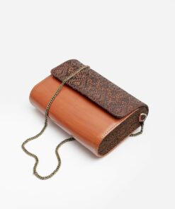 Exquisitely Crafted Orange Leather Sling Bag A Symphony of Teak Wood and Hand-Tooled Art
